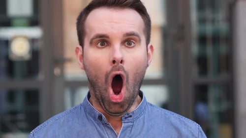 Man Reacts With Surprise, Close Up