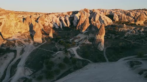 Sunset in Cappadocia red valley with fairy chimneys