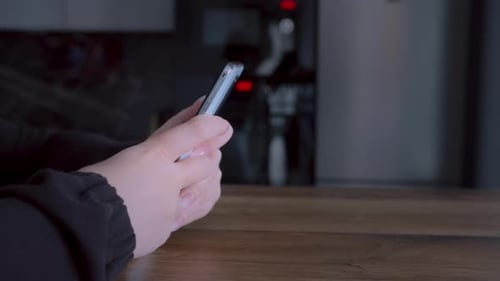 Close Up of Hands Using a Smart Phone