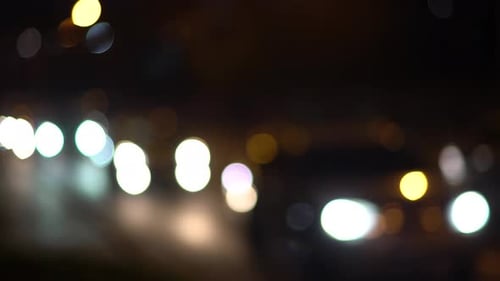 Defocus Cars Driving on the Night Highway with Lights