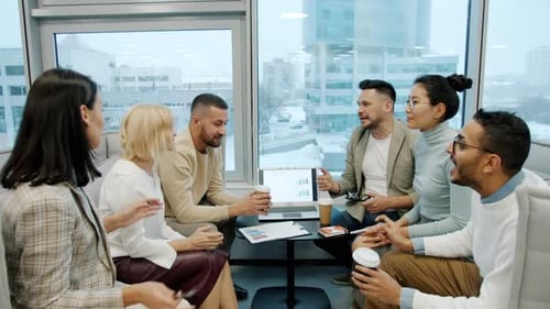 Happy Coworkers Sharing Ideas Brainstorming Then Doing High-five in Modern Office