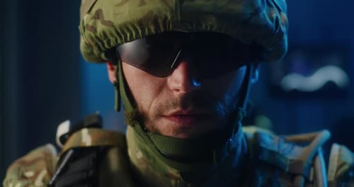 Soldier Wearing Helmet and Camouflage