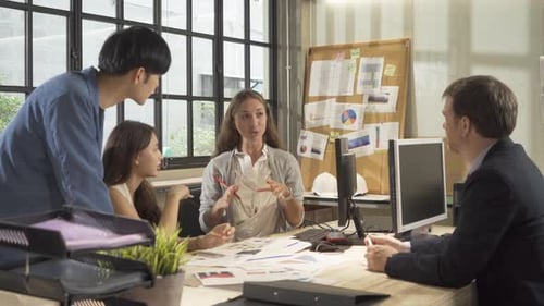 Team Meeting in a Bright Modern Office