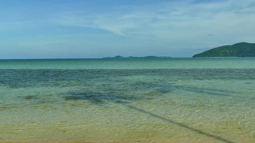 Beautiful tropical beach sea ocean with blue sky and white cloud