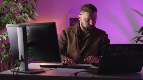 Man Coding at Home