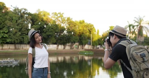 Couple taking a photo at the park