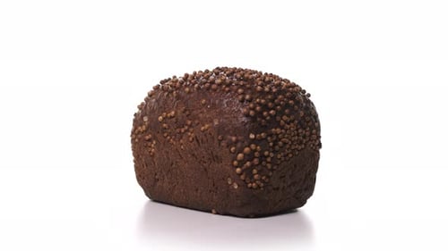 Dark Brown Bread with Seeds Rotating