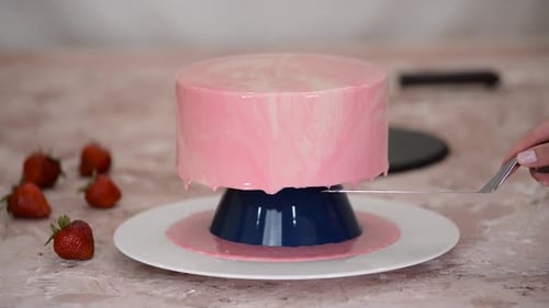 Pink Frosted Cake Decoration with Spatula