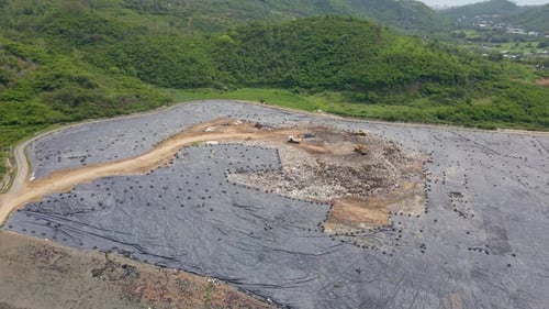 Aerial Top View Video of a Solid Waste Landfill. City Waste Treatment Location. Environmental