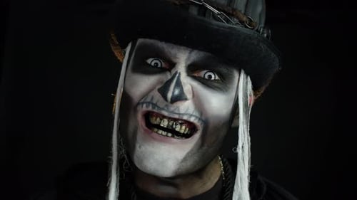 Man in Skeletal Face Paint with Blackened Teeth