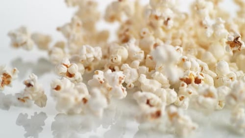Popcorn falling down. Slow Motion.