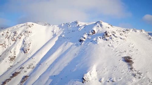 Snowy Mountain Range Aerial View in Winter