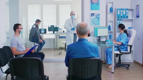 People Waiting in Doctor's Office During Daytime