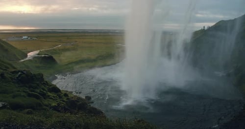 Seljalandfoss Waterfall in Summer Sunset Iceland