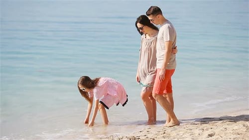 Beautiful Tropical Beach Landscape with Family Enjoying Summer Vacation