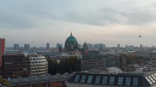 Forwards Flying Over Modern Buildings Near Berlin Cathedral