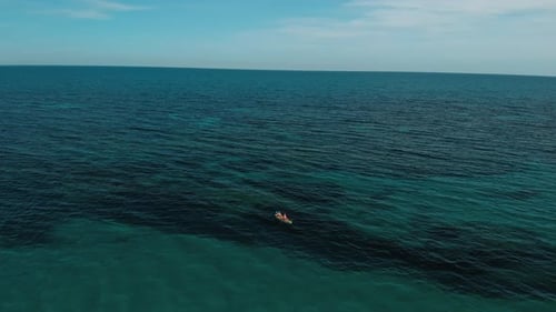 Aerial Drone Shot of Friends Kayak in Ocean