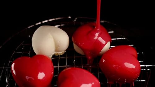 Heart Pastries Decorated with Red Icing Close Up