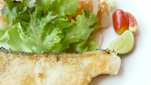 Close Up of Grilled Fish with Salad