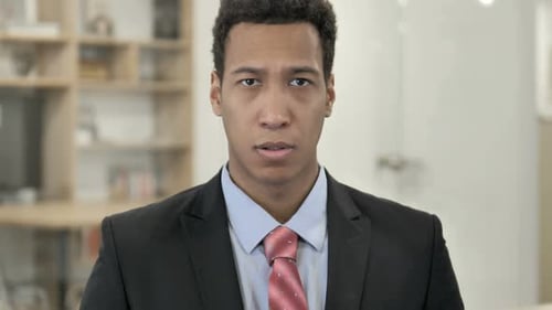 Serious Professional Young Adult Hand Stop Gesture