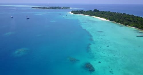 Beautiful aerial abstract view of a summer white paradise sand beach and aqua blue ocean background