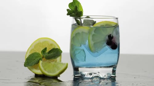 Refreshing Blue Cocktail with Lemon and Mint