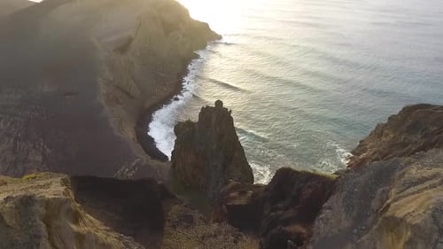 Rocky coastline, the sight of a collapsed vulcano.