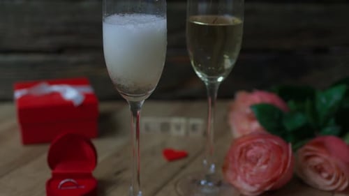 Pouring Champagne for a Romantic Engagement Celebration