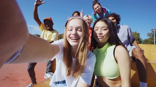 Diverse Group of Friends Smiles Together in City
