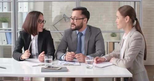 Business Professionals Collaborating at Modern Office Workplace