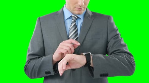 Businessman using smart watch