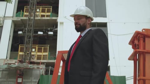 Portrait of a Successful Handsome Engineer of Bearded Senior Architect Builder Businessman in White
