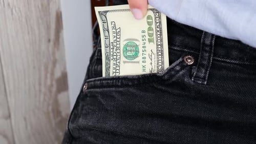 Close Up Hand of Businesswoman Taking Banknote From Pocket