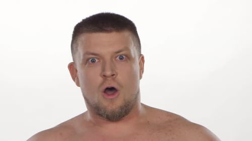 Man Reacts with Exaggerated Shock, Surprise, and Fear