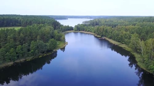 Clouds Reflected in The Mirrored Water of The Lake. Aerial Survey
