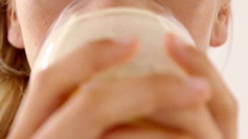Woman having smoothie