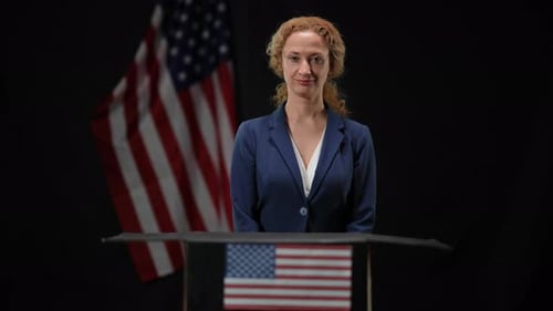 Woman at Podium with American Flag