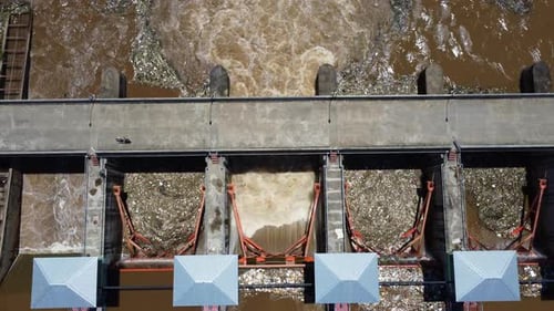 Aerial view of water released from the drainage channel of the concrete