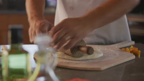 Rolling pizza dough
