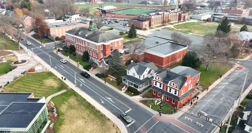 Aerial establishing shot of university college campus and school in USA. Aerial establishing shot.