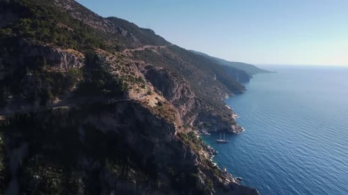 Aerial View of the Rocky Coast of Turkish Lands with Mediterranean Sea and Curve Road at Summer Day