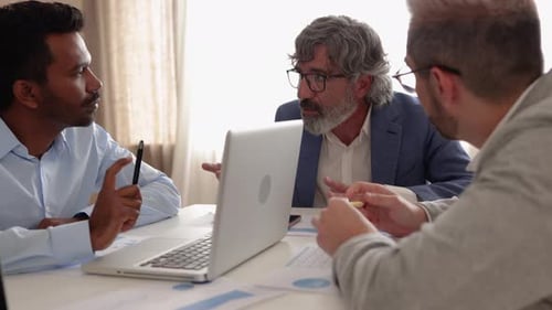 Multiethnic and Generational Business People Working Together Inside Bank Office