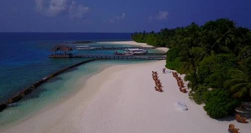 Natural birds eye abstract shot of a sunshine white sandy paradise beach and blue sea background in