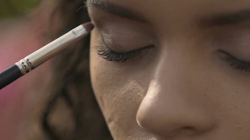 Experienced Makeup Artist Applying Eye Shadow Preparing Model for Fashion Show