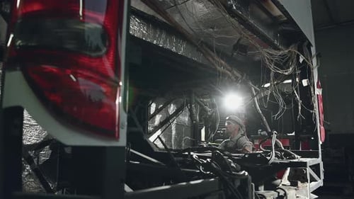 Remplacement du moteur dans un autocar.