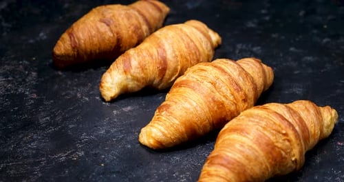 Croissants on a Vintage Black Background