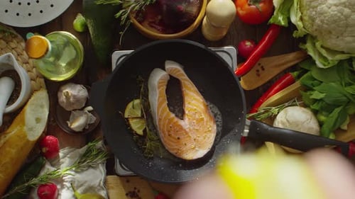 Salmon Fillet Cooking with Vegetables and Spices