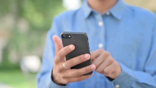 Hands Close Up of Woman Browsing Smartphone
