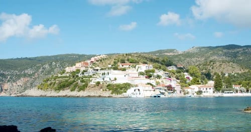 Coastal Village With Turquoise Water and Clear Skies
