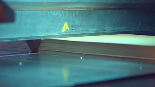 Automated Cutting Machine Precisely Slicing Paper Stacks